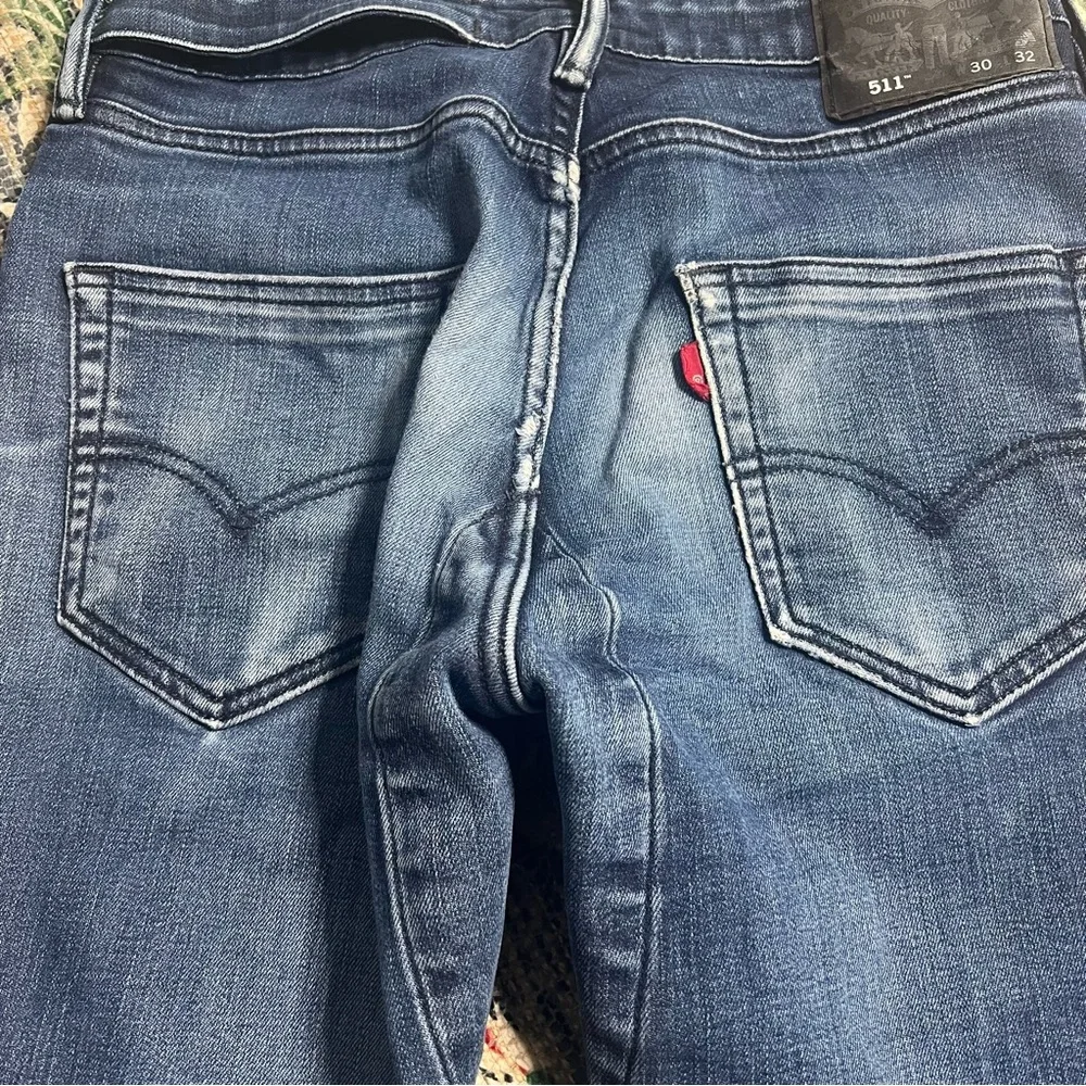 Levi’s 511 green pocket slim fit distressed denim jeans